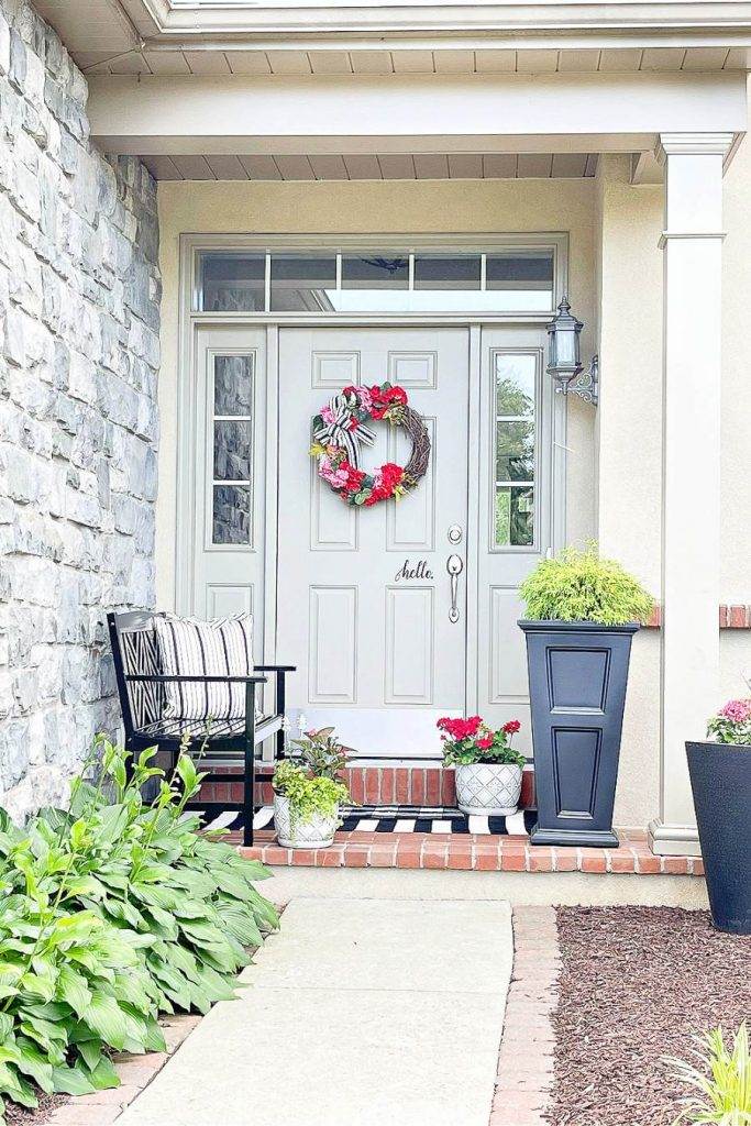 SUMMER FLOWERS ON A PORCH