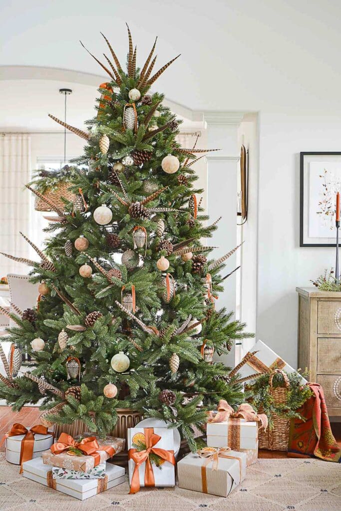 Christmas tree with distressed ornaments on it.