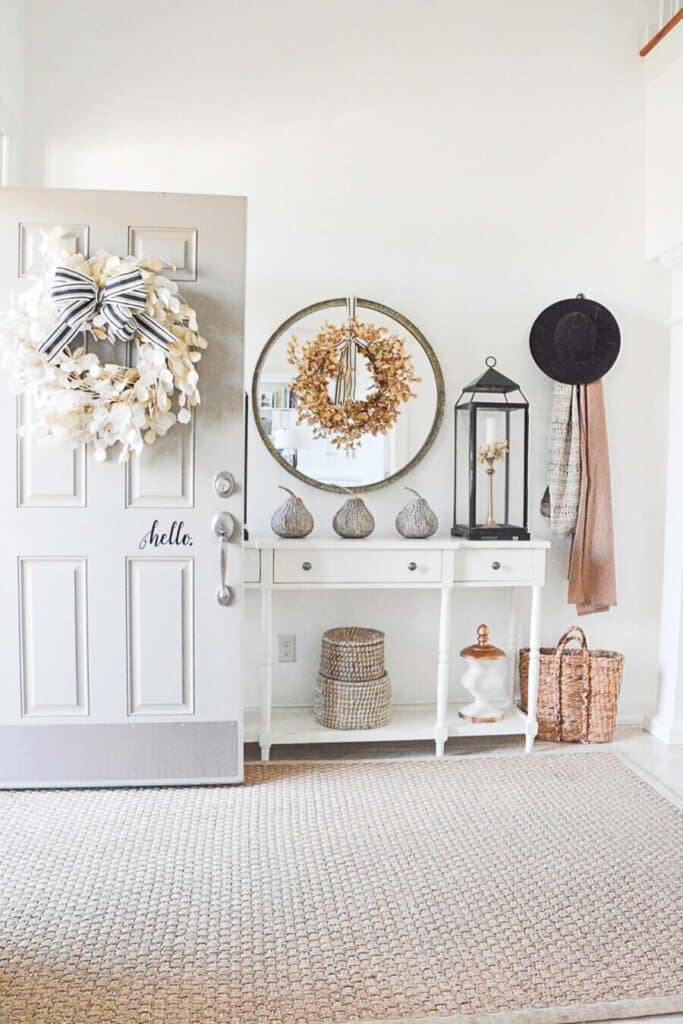 fall foyer ideas- fall foyer with wreath on a mirror