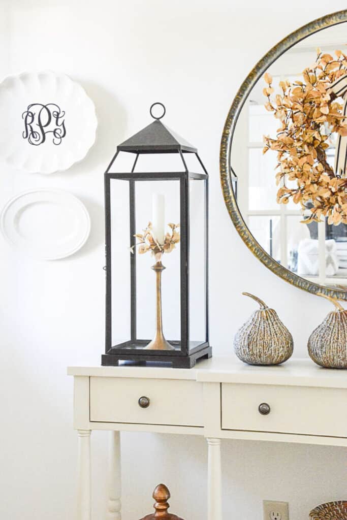 lantern on a console table