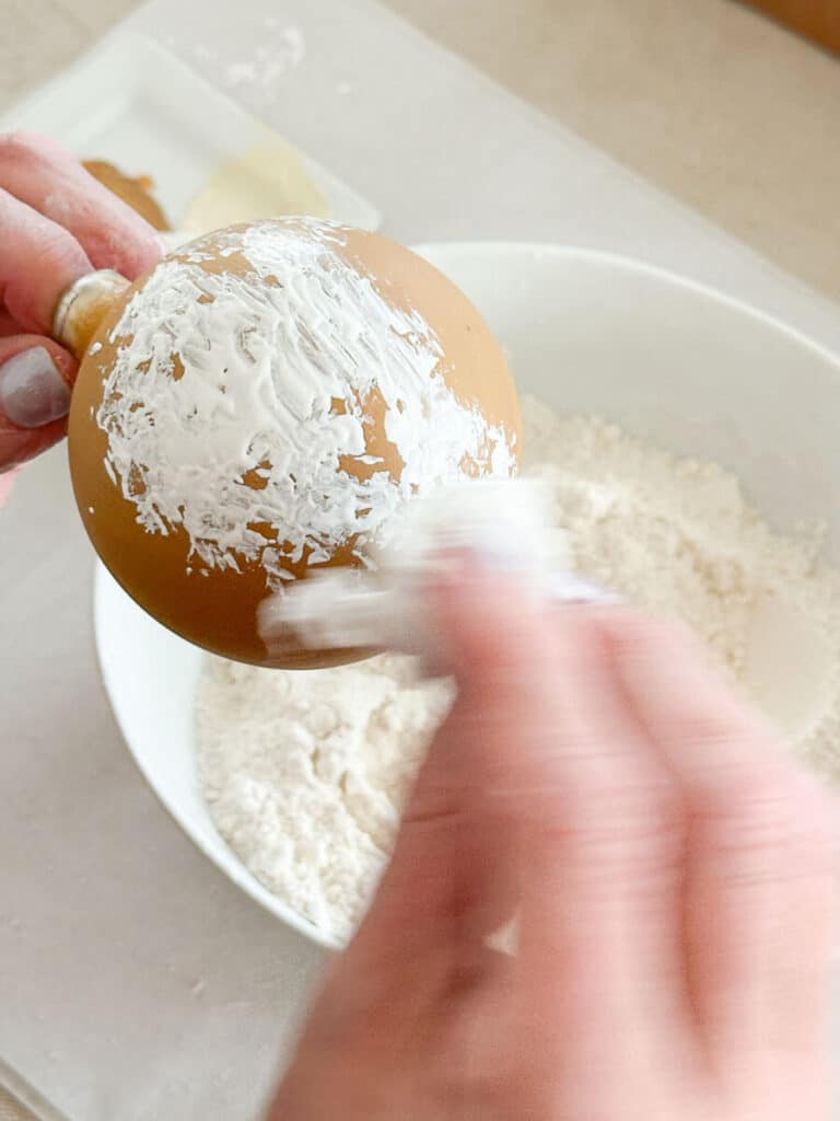 DISTRESSED ORNAMENTS-applying dabs of paint to the Christmas ball