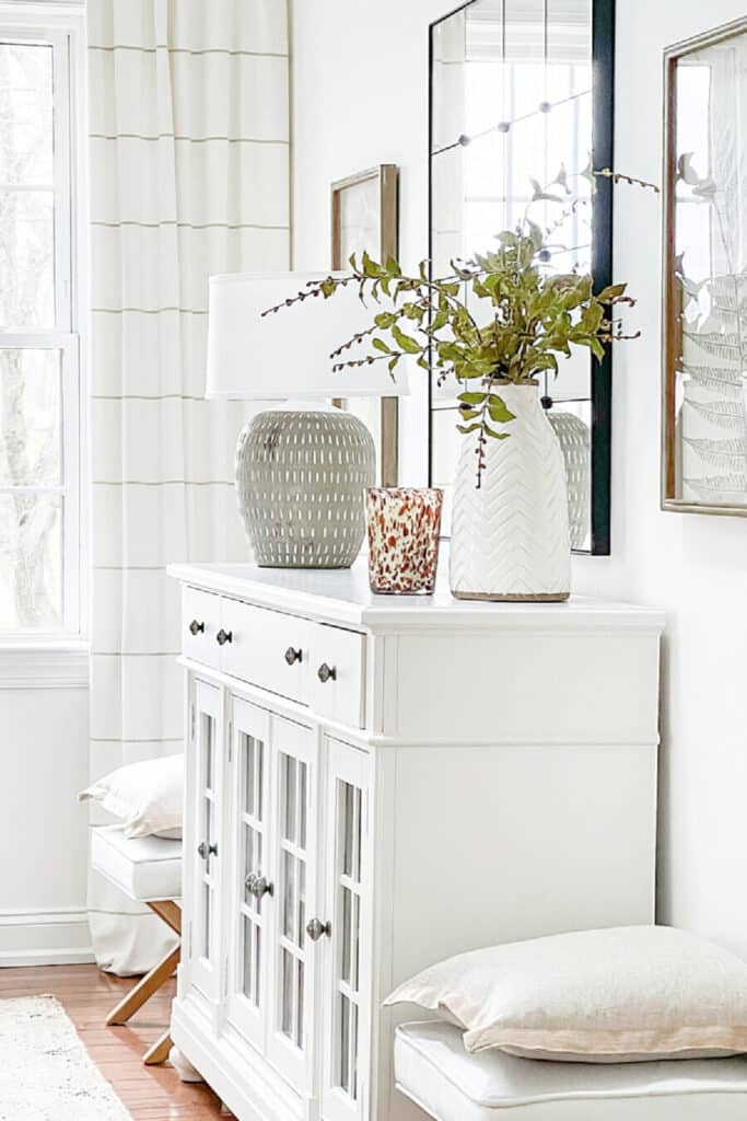 living room sideboard with luury items