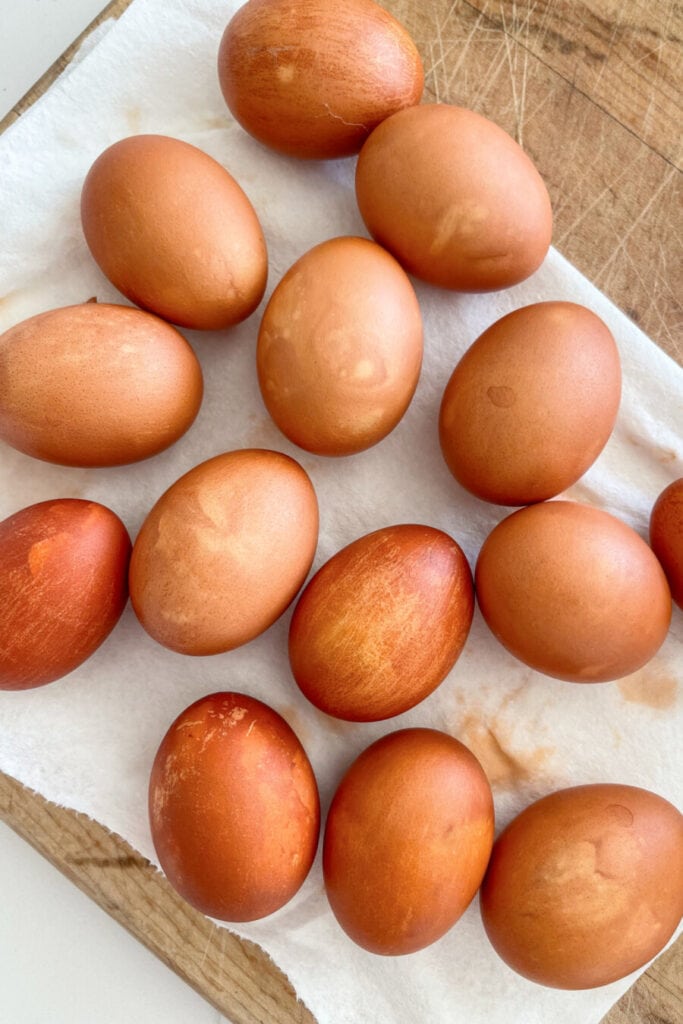 onion skin dyed Easter eggs-EGGS DRYING ON A PAPER TOWEL