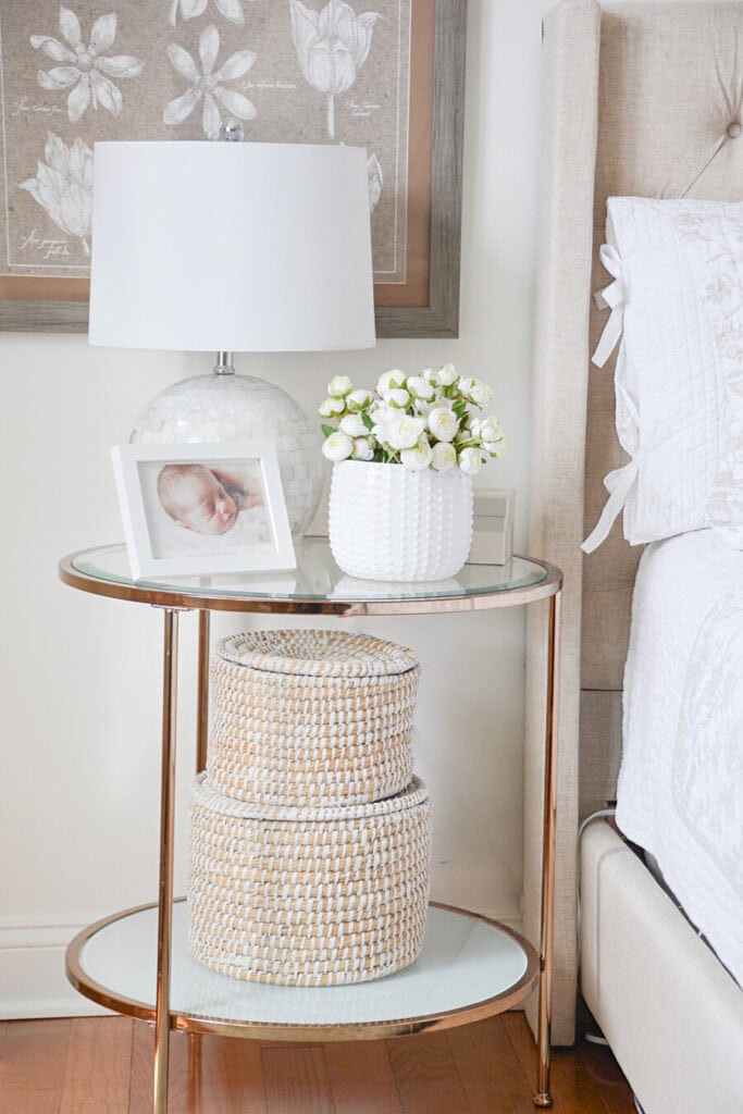 spring home tour- night stand with a pot of ranunculus on it