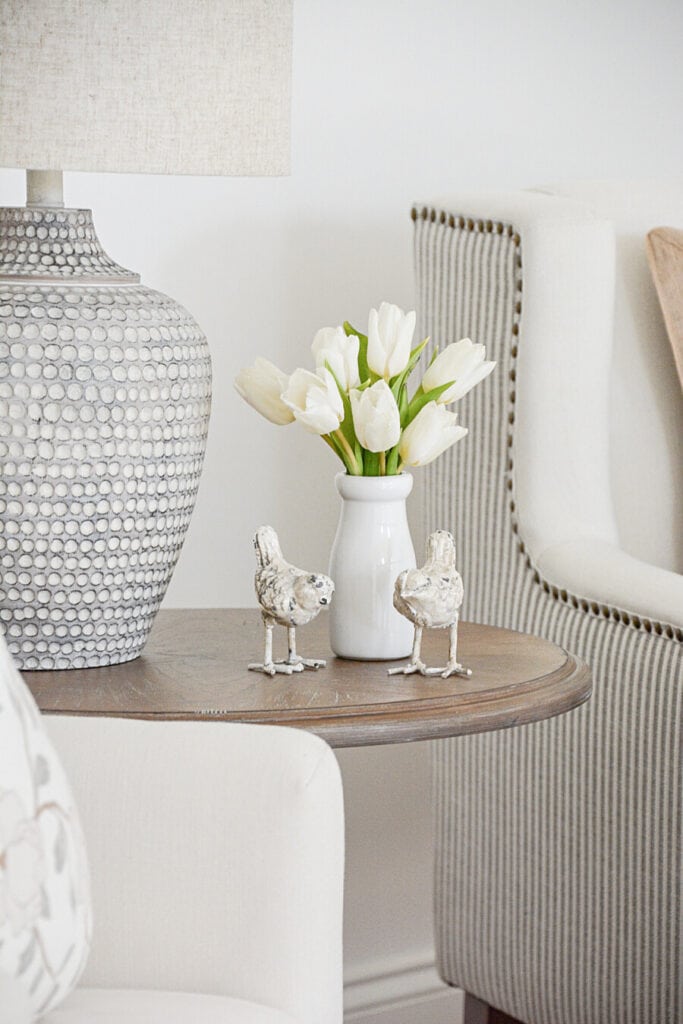 spring home tour- vase of white tulips and white metal birds