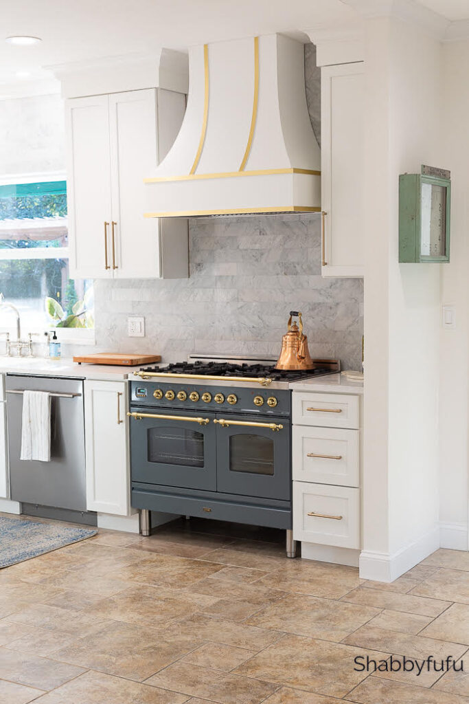 beautiful stove and hood in kitchen