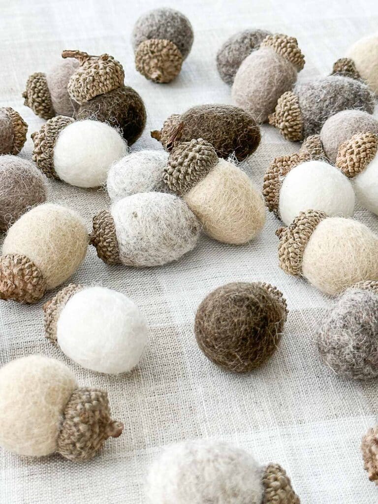 GROUP OF WOOL ACORNS